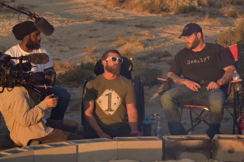 Veterans being filmed and interviewed around a fire pit at a Veteran Retreats Foundation retreat